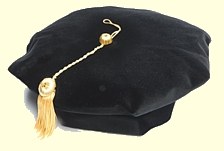 8 corner black velvet doctoral tam with gold metallic tassel.